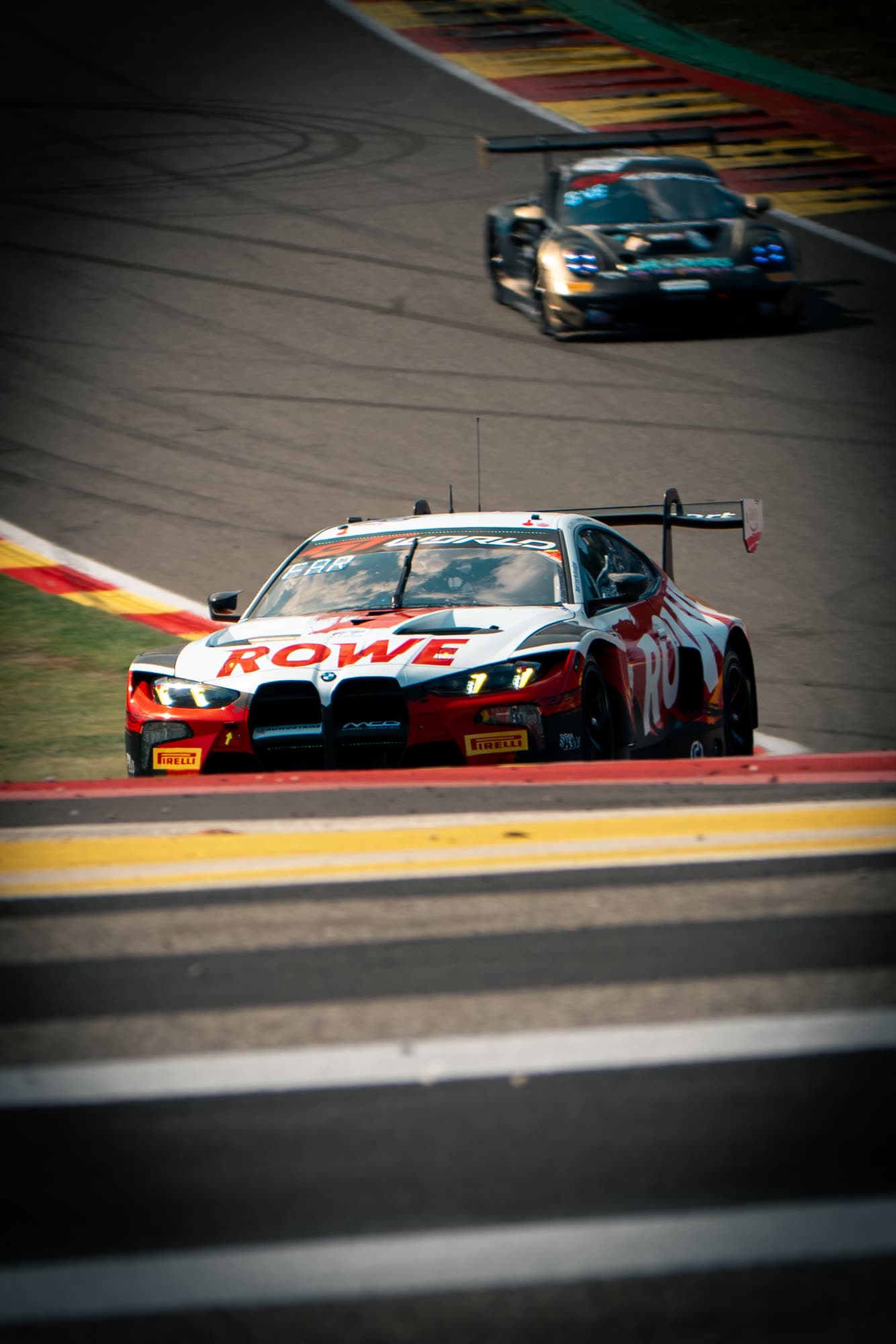 GT3 car shot through a blurred foreground at Spa